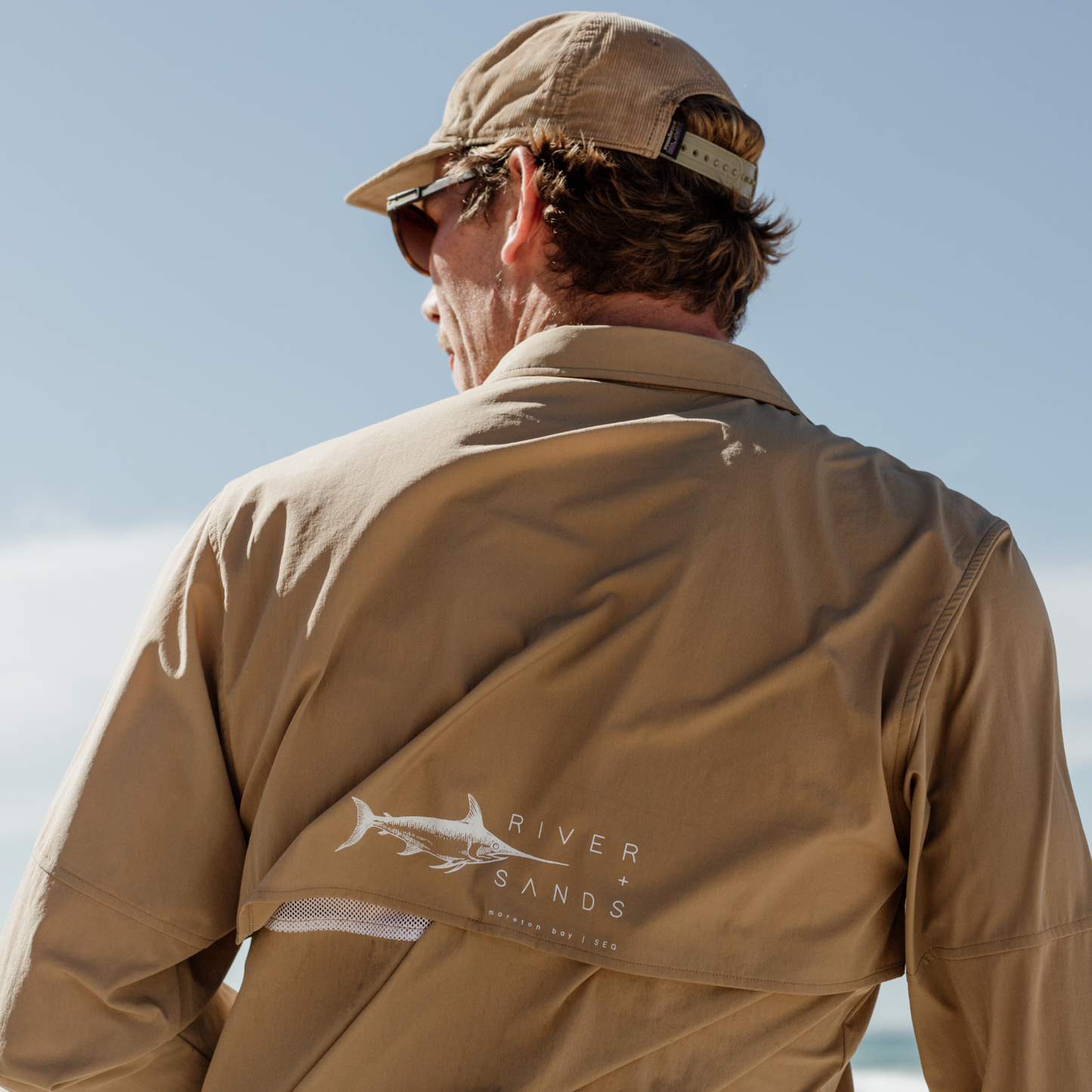 Back of the Tan River Adventure Shirt showing the mesh back ventilation.