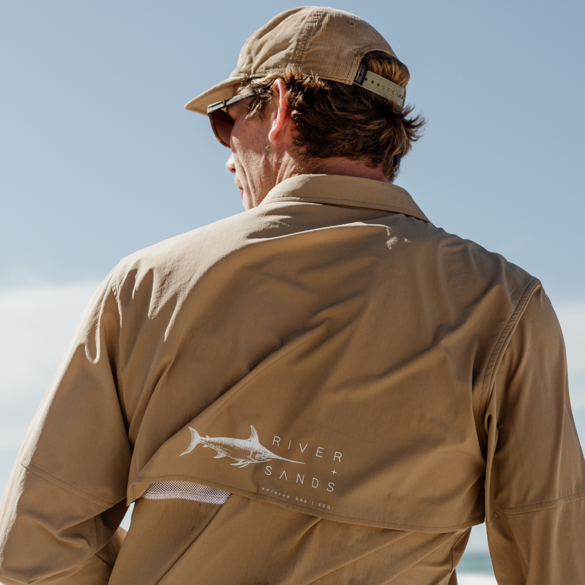 Back of the Tan River Adventure Shirt showing the mesh back ventilation.