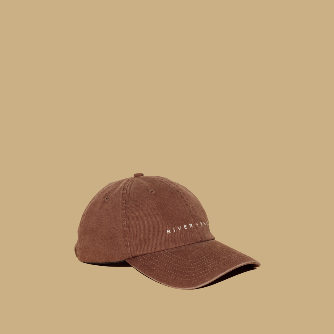 Tan River and Sands Dad cap product shot angled.