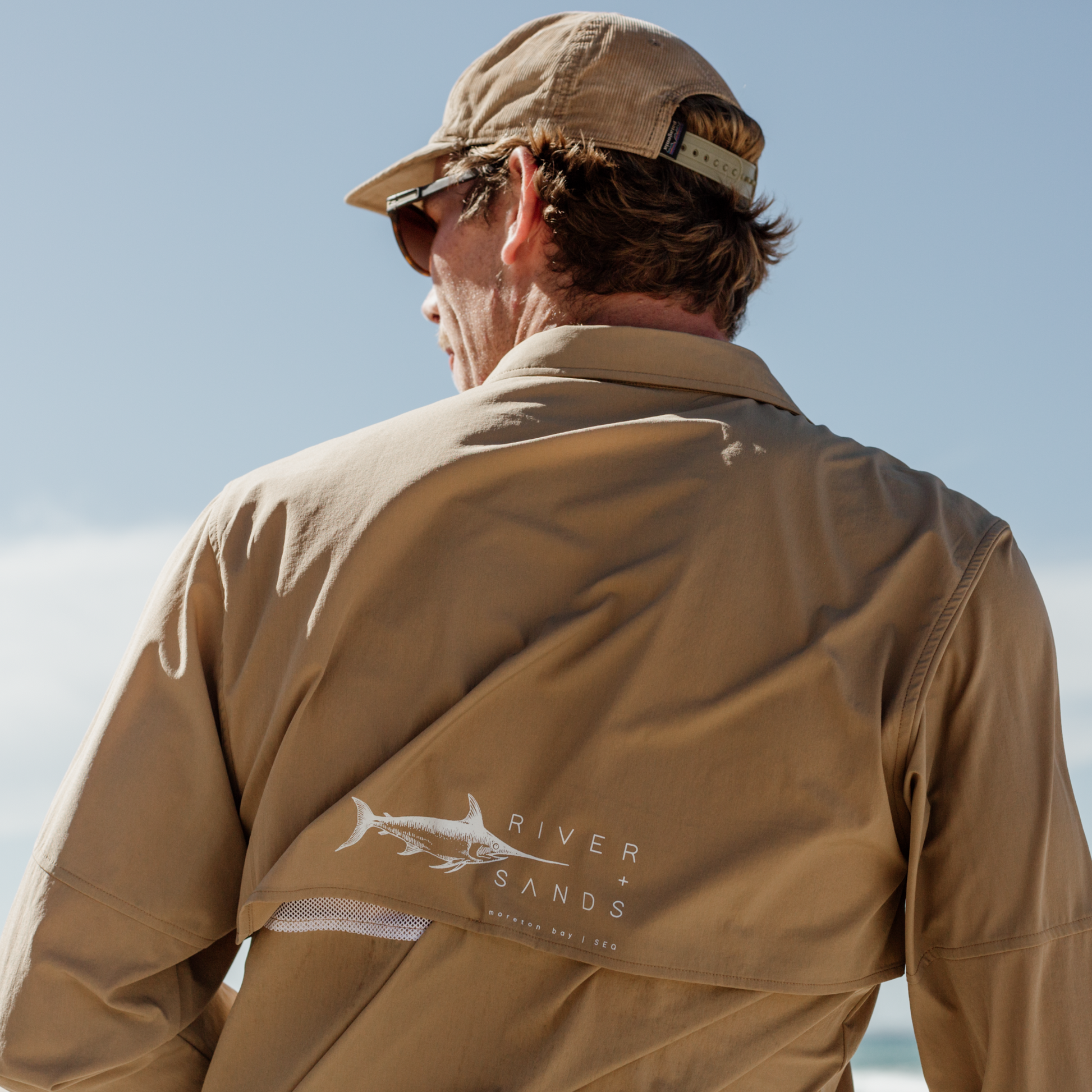 Back of the Tan River Adventure Shirt showing the mesh back ventilation. 