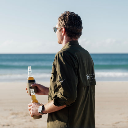 A man wearing the Khaki River Adventure Shirt outdoors – lightweight, quick-dry performance gear designed in Brisbane.